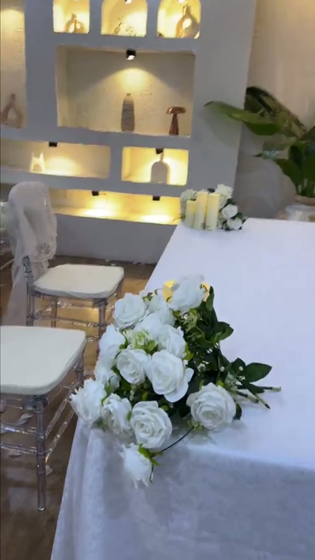 White roses on a ceremony table